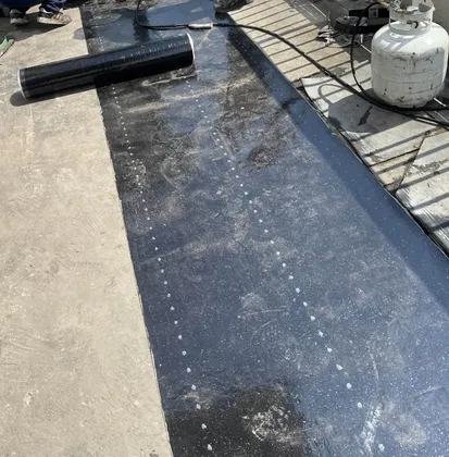 roofers replacing flat roof